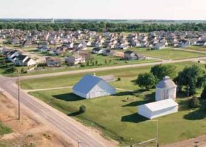 new homes replacing farmland on the edge of town