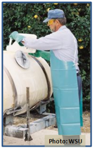 man wearing protective apron